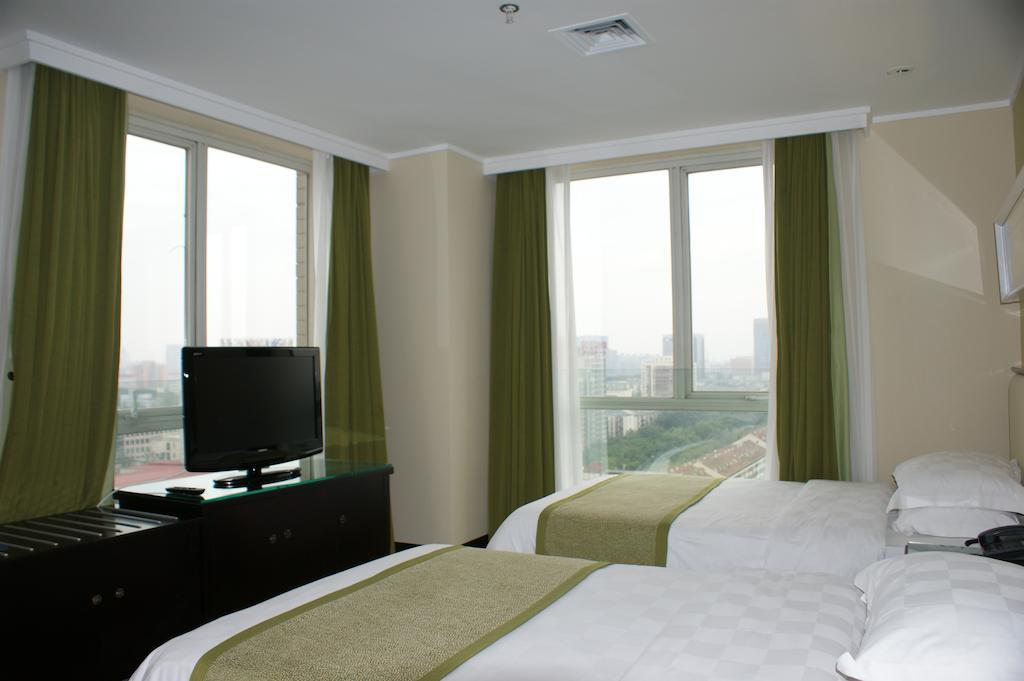 Jinma Hotel Pekín Habitación foto